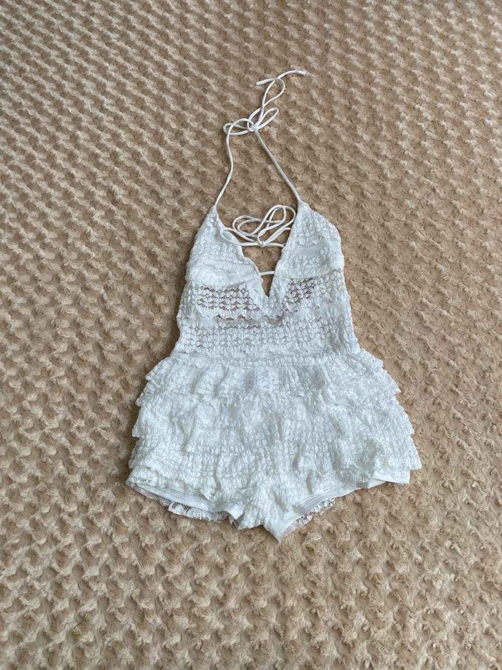 New Women Small halter-neck lace romper featuring a lace-up front detail